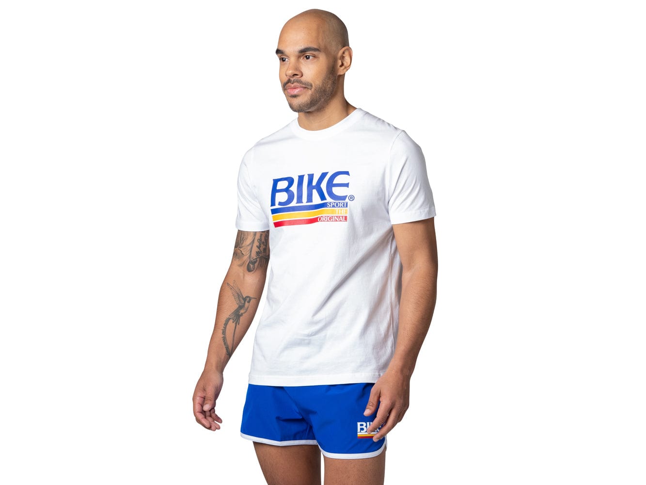 Man wearing white BIKE® logo tshirt