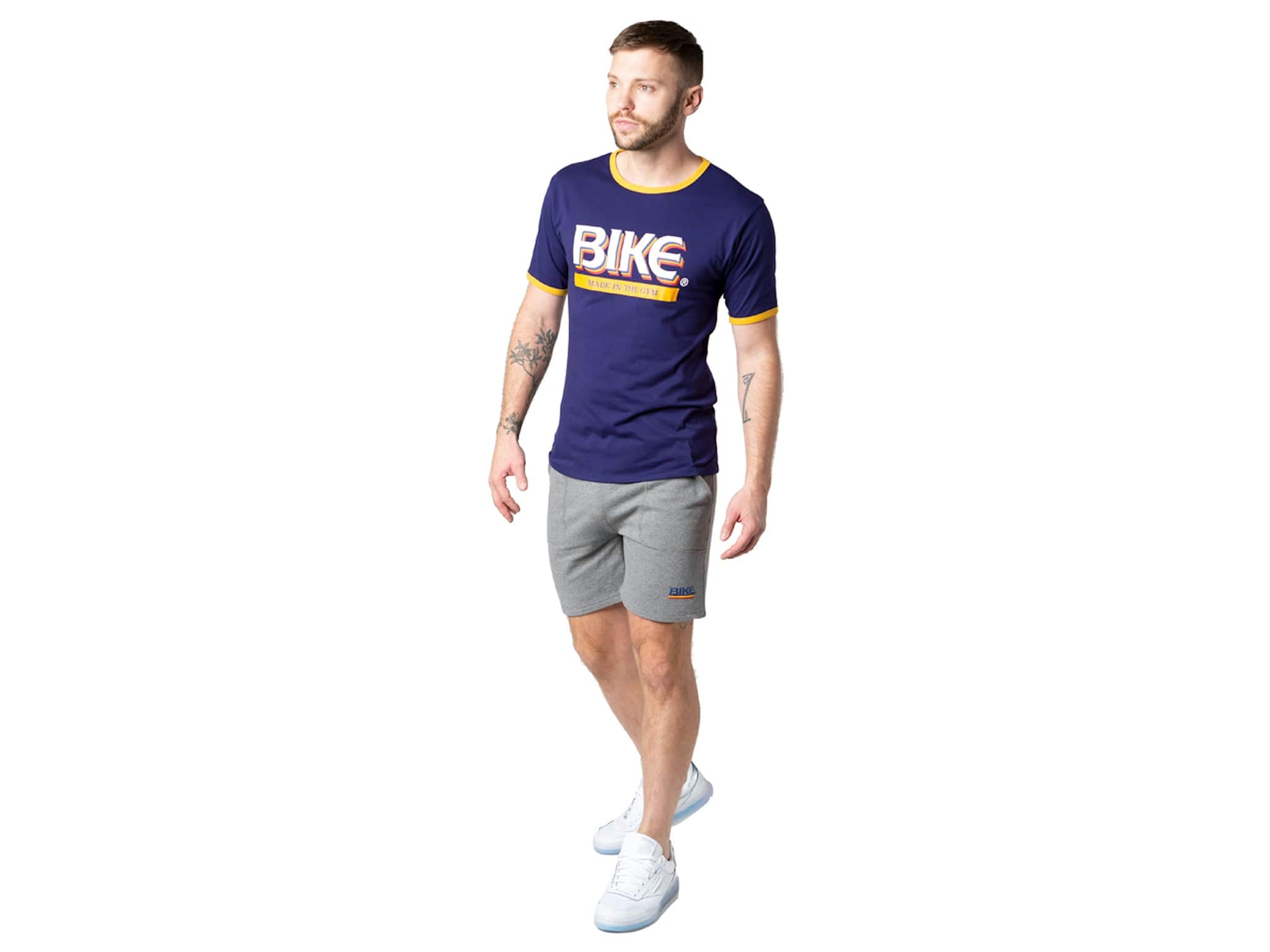 Man wearing blue BIKE® logo tshirt