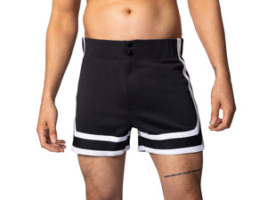 Man wearing black BIKE® athletic stripe  coaches short