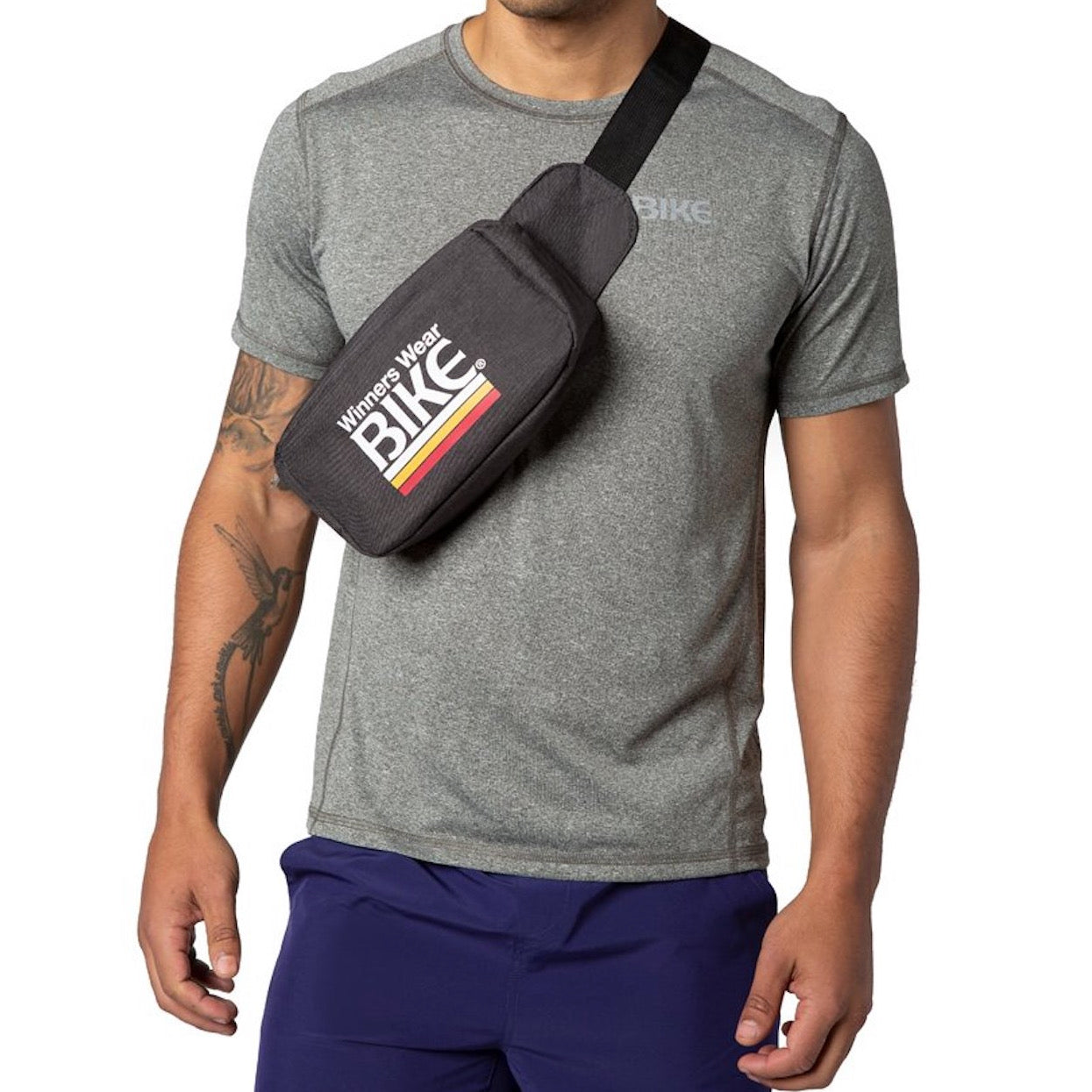 Man wearing BIKE® black fanny pack and accessories