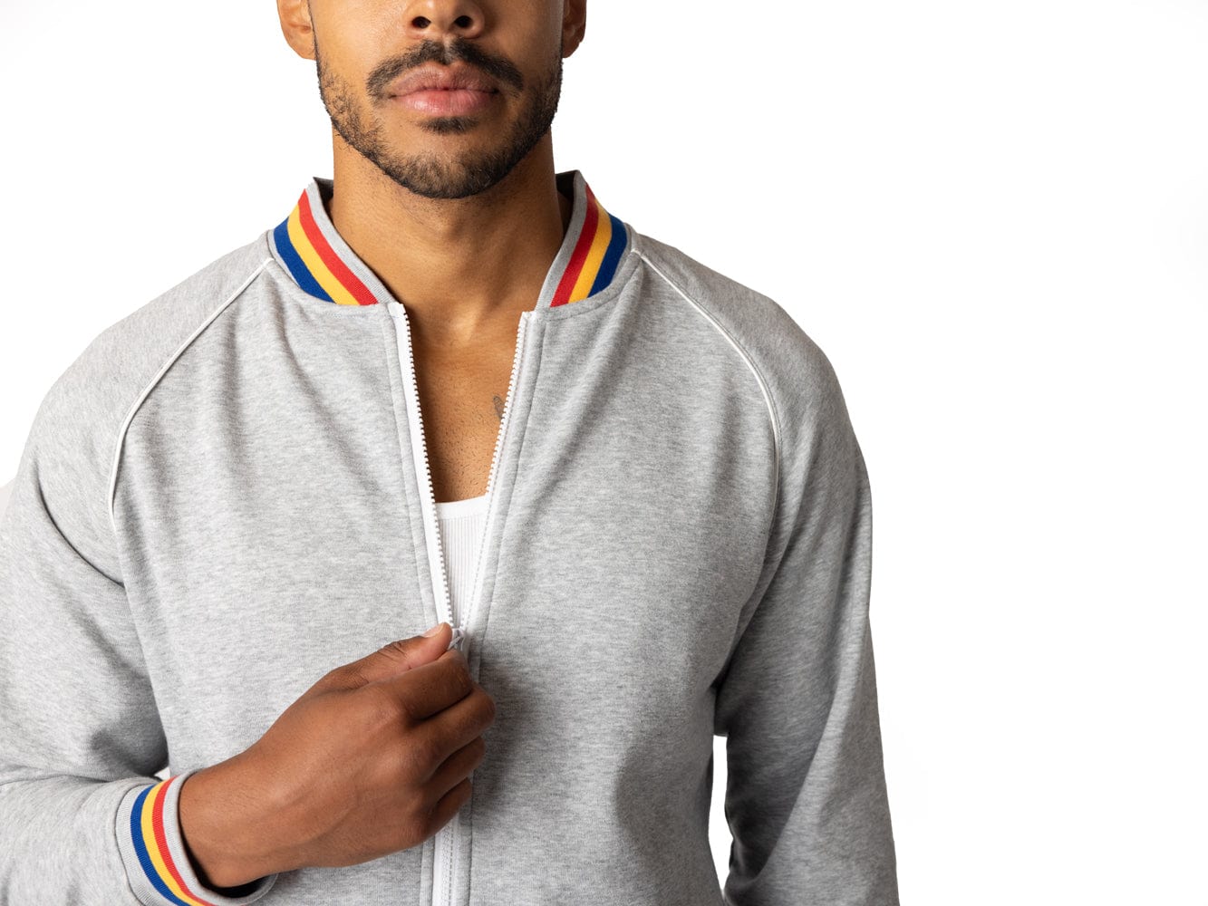 Man wearing grey BIKE® french terry track jacket
