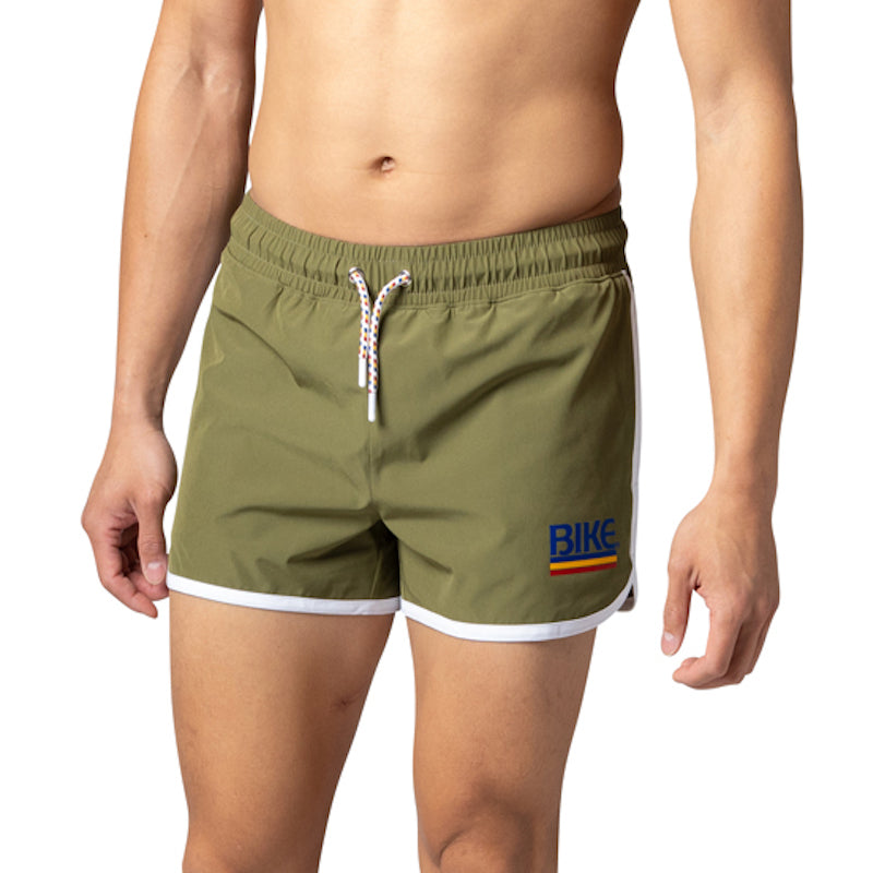 Man wearing BIKE® olive shorts
