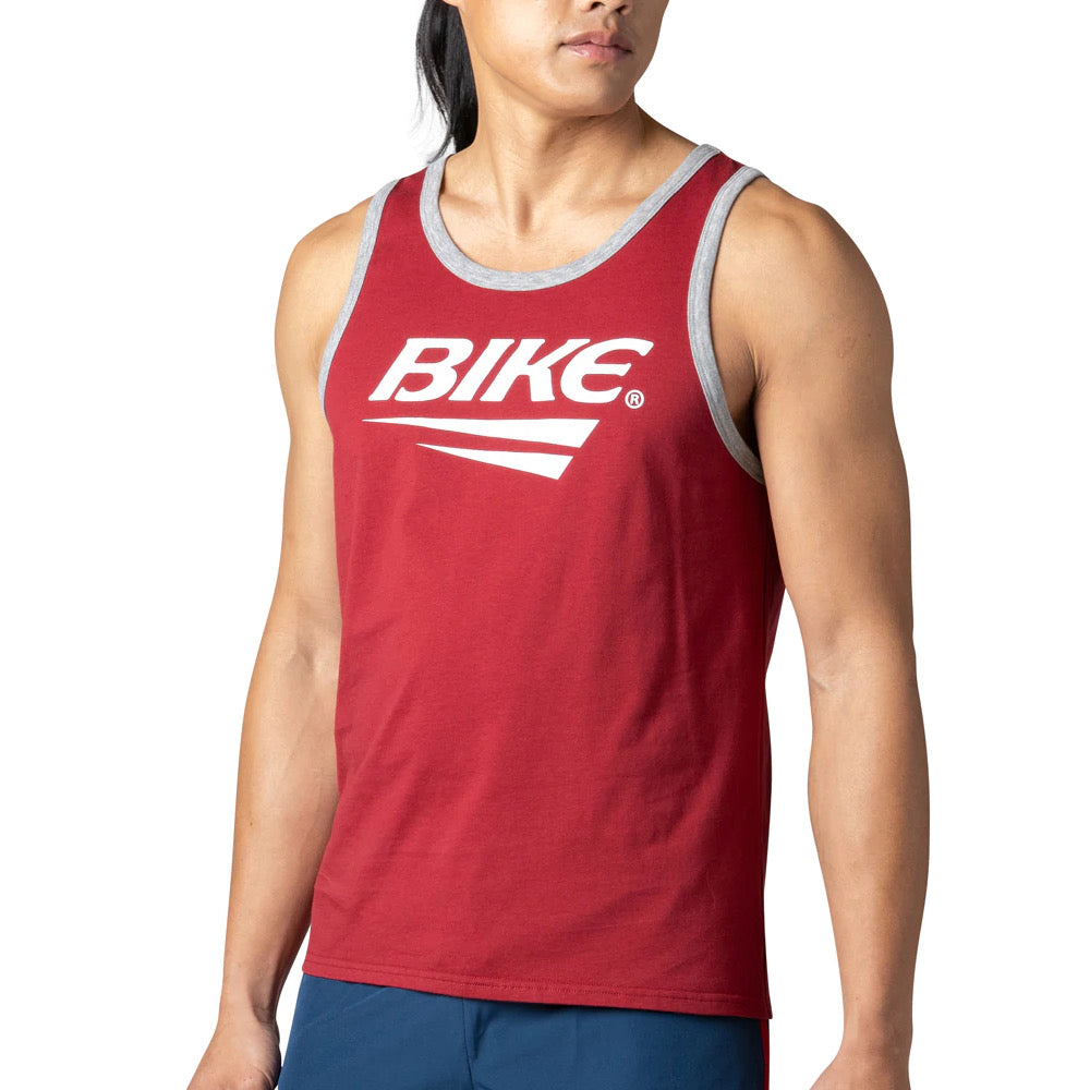 Man wearing red BIKE® logo tank top