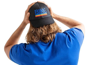 Man wearing black BIKE® baseball cap