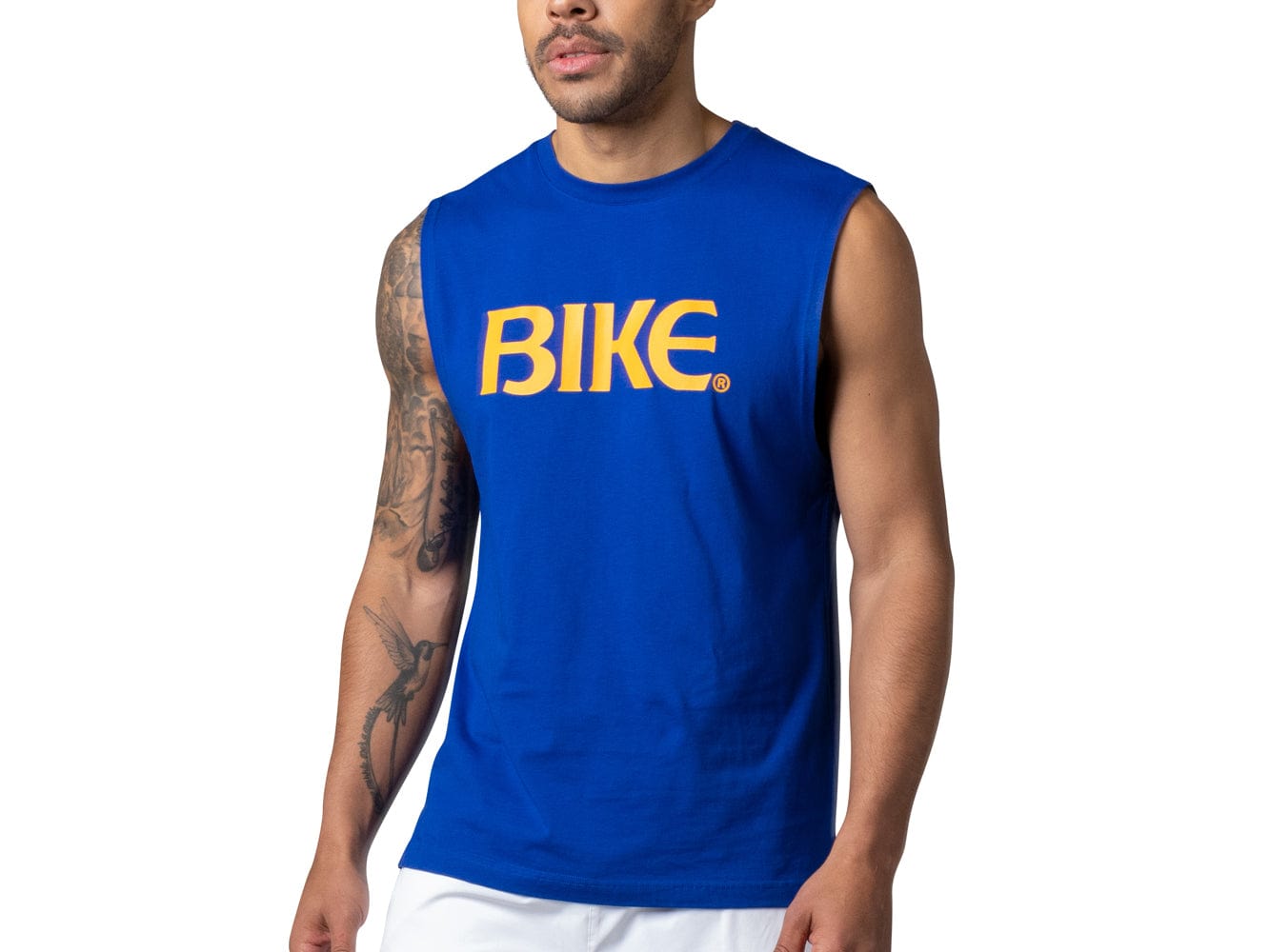Man wearing blue BIKE® sleeveless tshirt