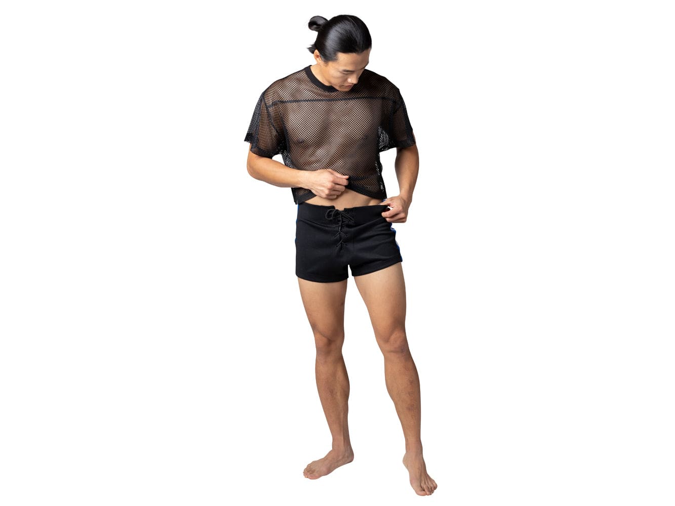 Man wearing black BIKE® football shorts