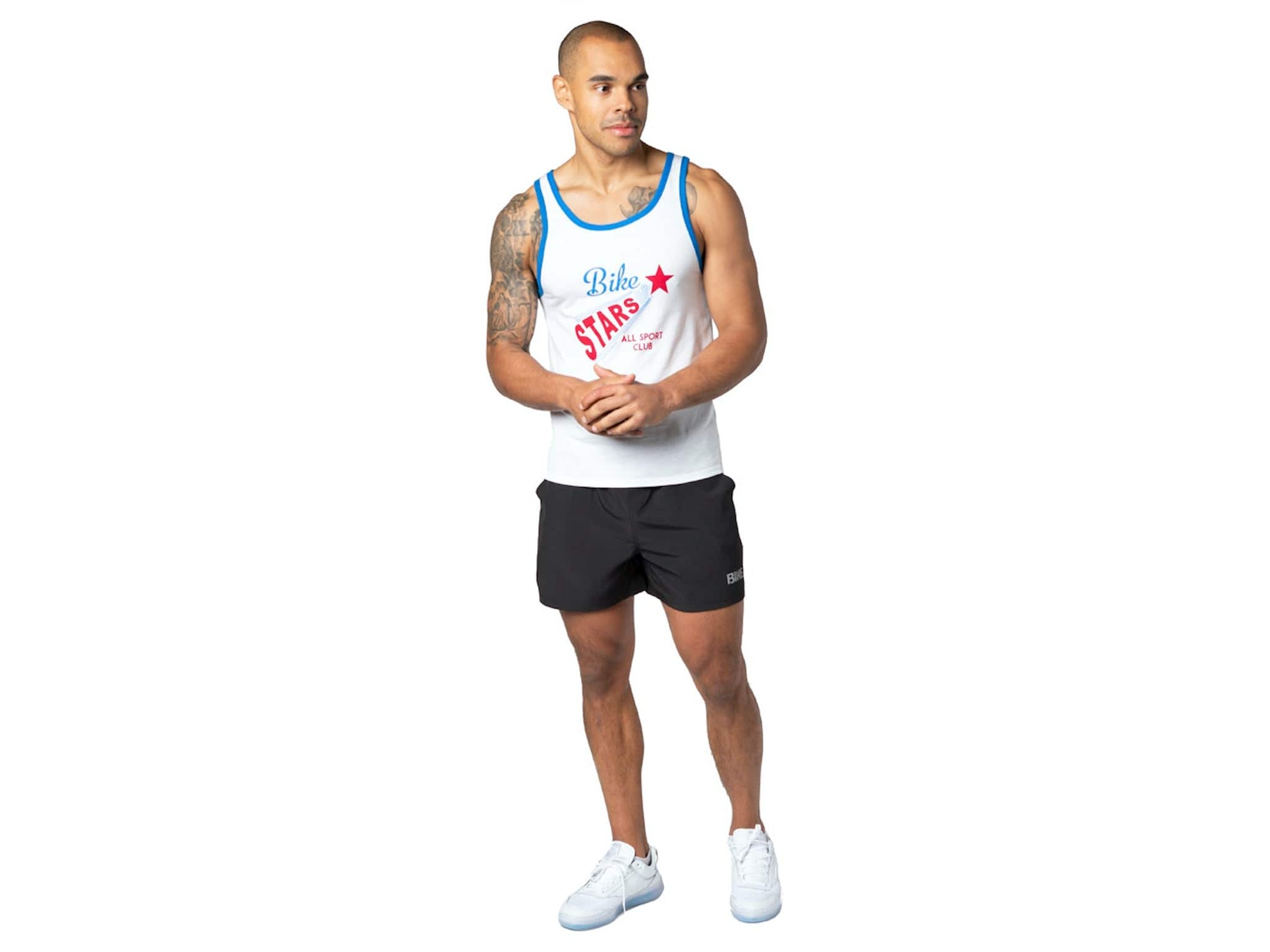 Man wearing white BIKE® logo tank top