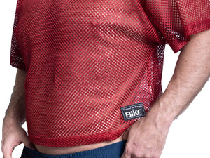 Man wearing red BIKE® mesh shirt