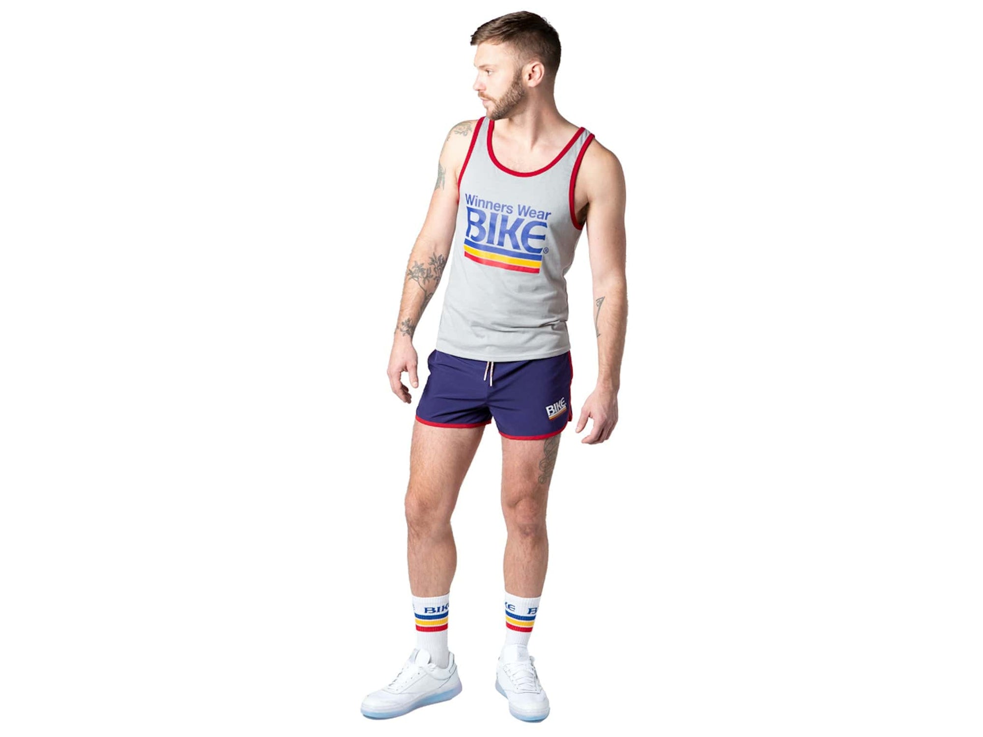 Man wearing grey BIKE® logo tank top
