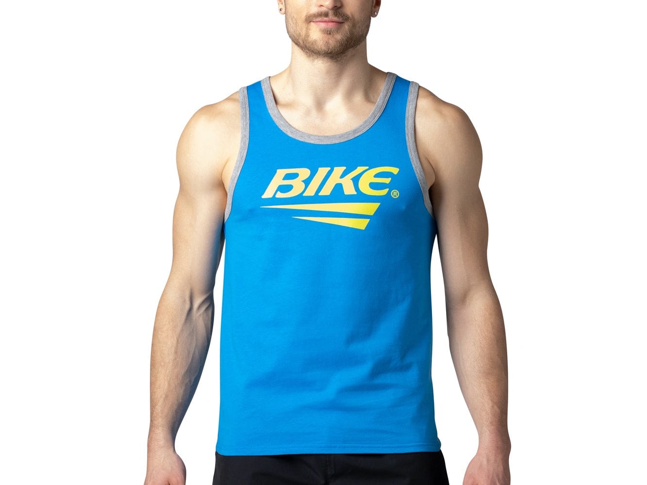 Man wearing blue BIKE® logo tank top