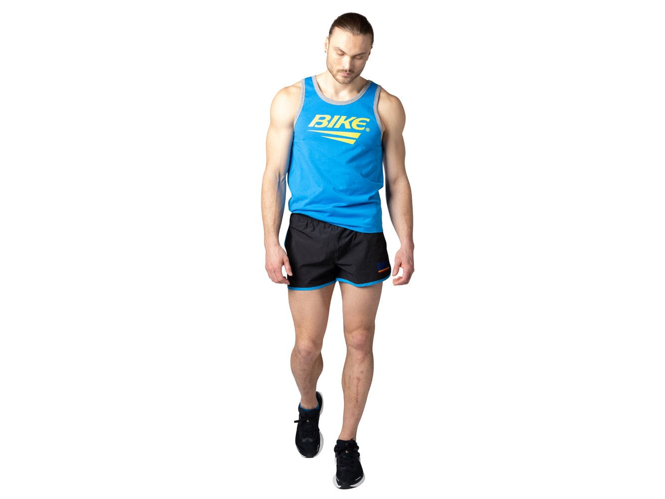 Man wearing blue BIKE® logo tank top