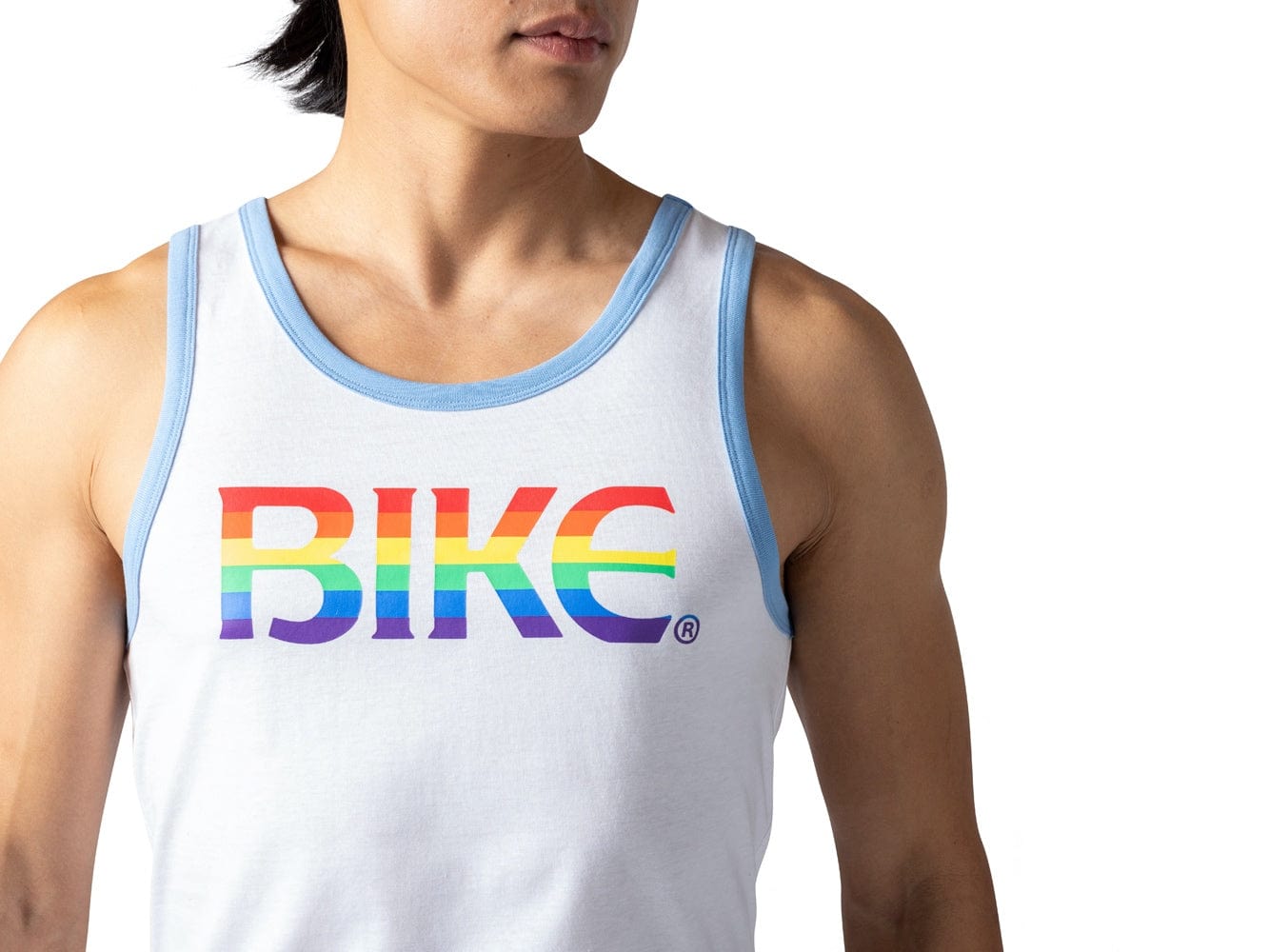 Man wearing white Pride BIKE® logo tank top