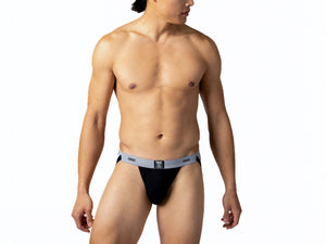 Man wearing black BIKE® swimmer jock strap